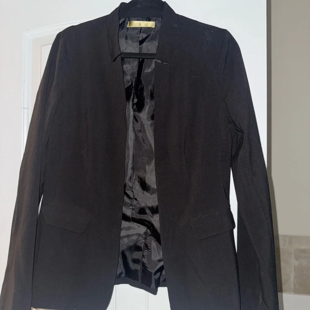 Black Blazer and Blue Jeans Outfit